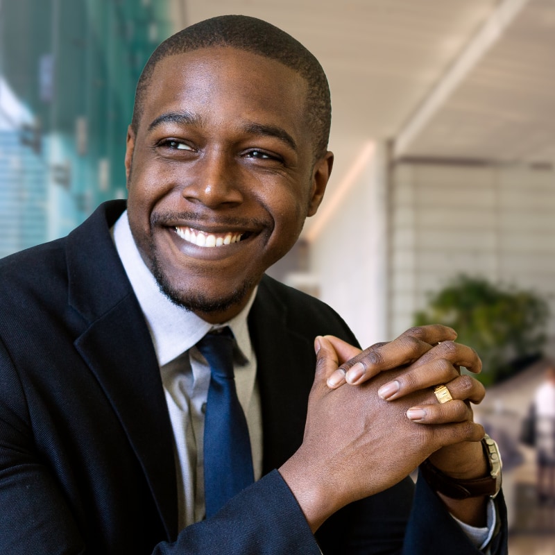 Young business man smiling