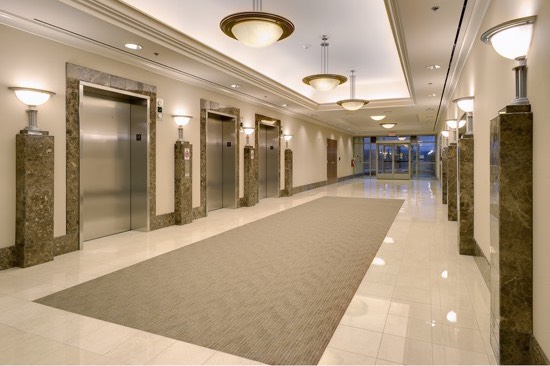 hallway with elevators